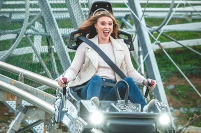 woman on mountain coaster skyland ranch