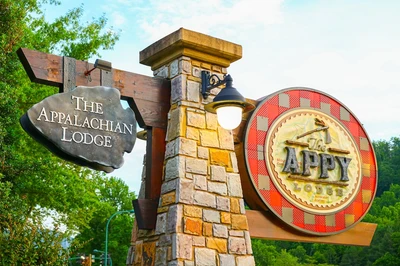The Appy Lodge sign sunset