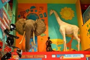 A two-trunk elephant and an albino giraffe at Ripley's Odditorium Gatlinburg.