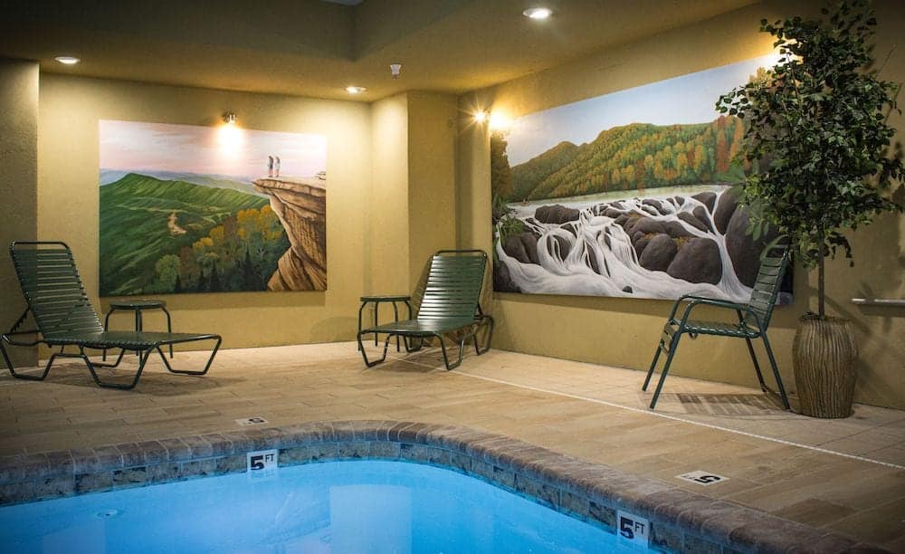 gatlinburg hotel indoor pool with art on the wall