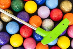 mini golf balls and putter